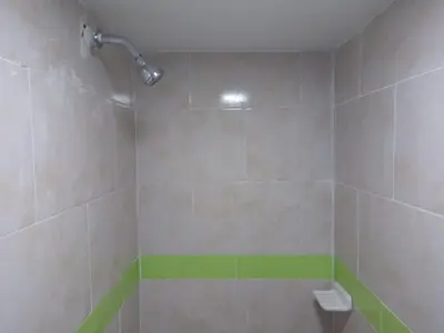 a bathroom with a shower with a toilet in it at HOTEL BOSQUE DE LAS AMERICAS in Cartagena de Indias