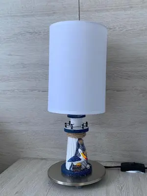 a lamp sitting on top of a table with a lampodox at Estudio Loft Cartagena in Cartagena de Indias