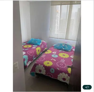 two beds sitting next to each other in a room at Rincon 94- Barranquilla- Rio Alto in Barranquilla