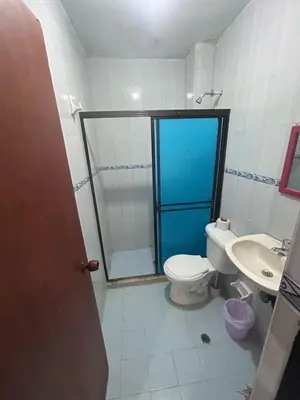 a bathroom with a shower and a toilet and a sink at Sophia House in Cartagena de Indias