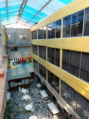 an overhead view of a building with tables and chairs at Hotel Toledo FL in Cartagena de Indias