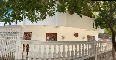 a white fence in front of a white house at MAR uno in Cartagena de Indias