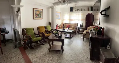 a living room with a bunch of chairs and a couch at MAR uno in Cartagena de Indias