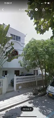 a white fence in front of a white building at MAR uno in Cartagena de Indias