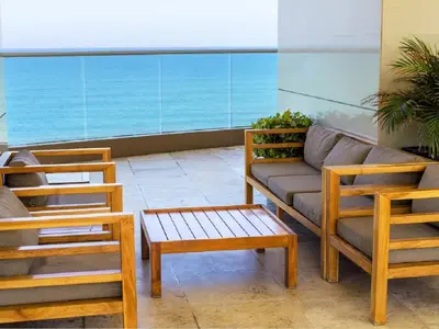 a living room with a couch and two chairs at Apartamento Palmetto Eliptic - Best Seaview in Cartagena de Indias