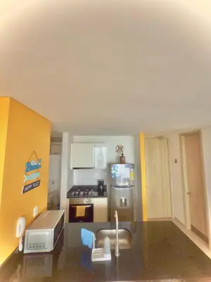 a model of a kitchen with a stove and refrigerator at Condo con vista al mar in Cartagena de Indias