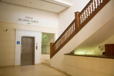 a hallway with a stairway in a building at Ganem Suites Cartagena in Cartagena de Indias