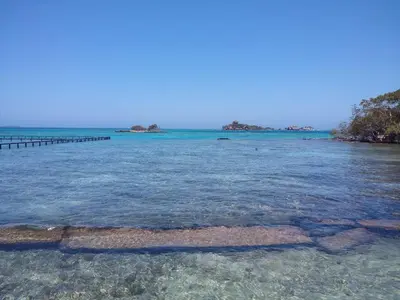 a view of the ocean with a pier in the water at APARTA-SUITES EN CARTAGENA JUNTO a LA PLAYA in Cartagena de Indias