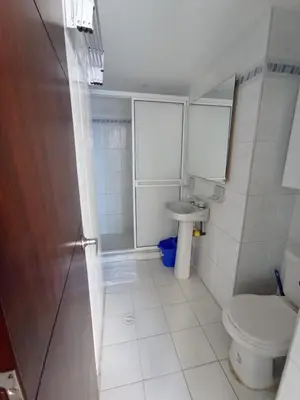 a small bathroom with a toilet and a sink at Amazing ocean view Apartment in El Laguito Cartagena in Cartagena de Indias