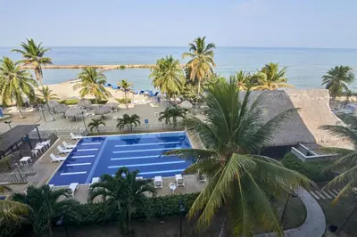 an aerial view of a resort with a swimming pool and the beach at Magico Apartamento Frente al Mar 3 Habitaciones PAZ222 in Coveñitas