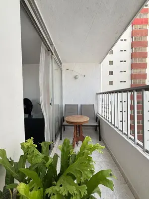 a balcony with a table and some plants on it at Apartamento ideal en Cartagena in Cartagena de Indias