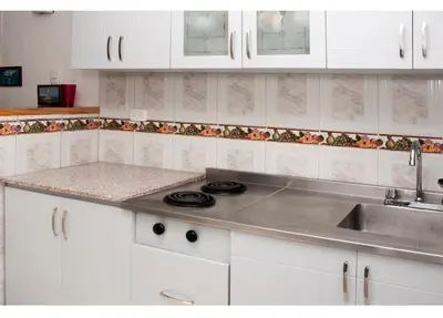 a kitchen with a sink and a counter top at III NICE 2 BEDROOM APARTMENT Bocagrande in Cartagena de Indias