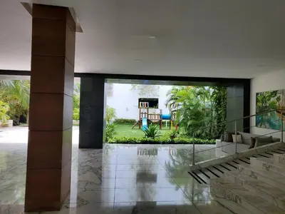 a lobby with a mural of a house at Morros Vitri memorable in Cartagena de Indias