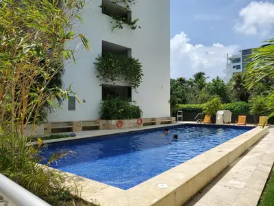 a swimming pool in front of a building at Morros Vitri memorable in Cartagena de Indias