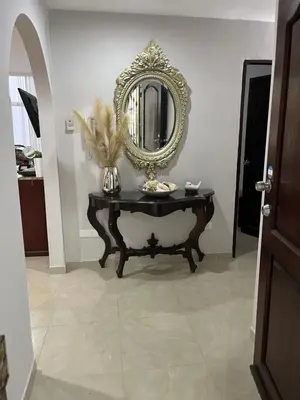 a mirror sitting on top of a table in a room at SOL, ARENA, MAR, y PISCINA in Cartagena de Indias