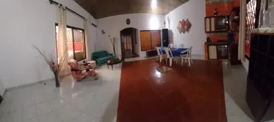 a large living room with a table and chairs at Casa ITCI Tours in Cartagena de Indias