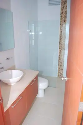 a bathroom with a sink and a toilet and a shower at Costazul Suites 705 in Santa Marta