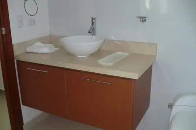 a bathroom with a sink and a bowl on a counter at Costazul Suites 705 in Santa Marta