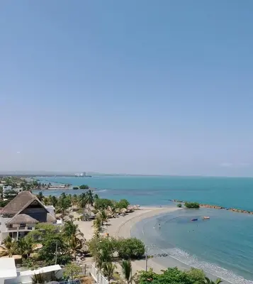 a view of the beach from a resort at Magico Apartamento Frente al Mar 3 Habitaciones FB73 in Coveñas