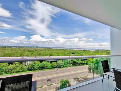 a view of a highway from a large window in a building at Morros Pelican Sunrise - Livin Colombia in Cartagena de Indias