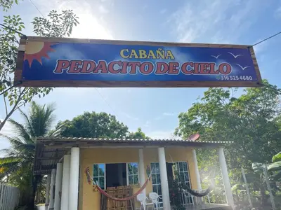a sign that reads cabana redactride cielo at Cabaña cerca al mar - A 200 mts in Coveñas