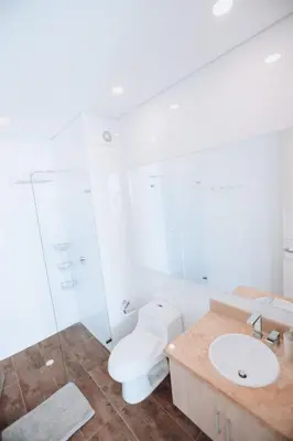a bathroom with a toilet and a sink at Deluxe Spectacular Sunset in Santa Marta
