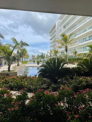 a view of a resort with palm trees and a pool at Edificio Morros Epic Lujo con Panorama in Cartagena de Indias