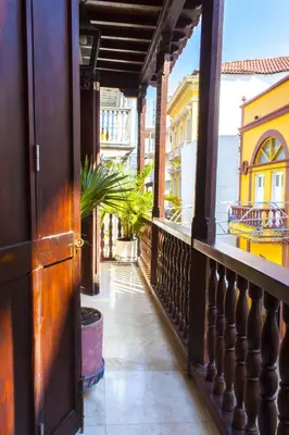 a balcony with a view of a building at Casa Cordoba Román in Cartagena de Indias