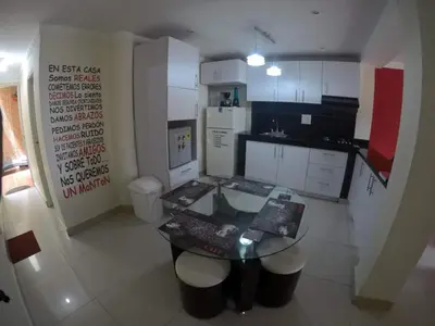 a kitchen with a glass table in a room at La casita de max y tim apt 201 in Cartagena de Indias