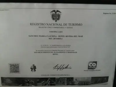 a sign for a ticket to a museum of treasonincialitution at Hotel Rivera Del Mar in Barranquilla