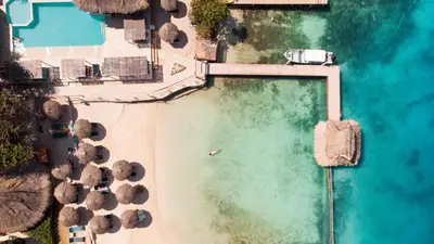 an aerial view of a beach and the ocean at Hotel Isla del Sol in Isla Grande
