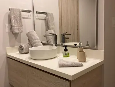 a bathroom with a sink and a mirror at Serena del Mar, Morros IO in Cartagena de Indias