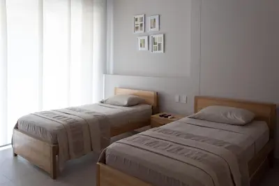 a bedroom with two beds and a window at Serena del Mar, Morros IO in Cartagena de Indias