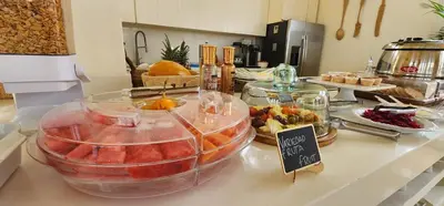 a kitchen counter with a bunch of food on it at Casa Diluca Cartagena Hotel Boutique in Cartagena de Indias