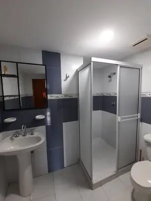 a bathroom with a shower and a sink and a toilet at Apartamento en Cartagena Edificio El conquistador Sector el Laguito - By Corfeinco in Cartagena de Indias