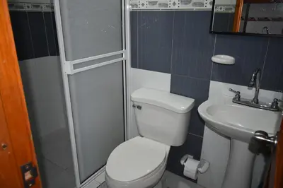 a bathroom with a toilet and a sink at Apartamento en Cartagena Edificio El conquistador Sector el Laguito - By Corfeinco in Cartagena de Indias
