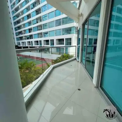 a balcony in a large building with a large window at Cartagena apartamento in Cartagena de Indias