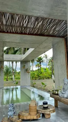a room with a table and a view of the ocean at Sea La Vie in San Bernardo del Viento