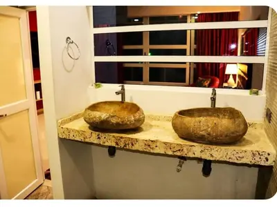 two sinks sitting on a counter in a bathroom at Casa con Piscina Privada Playas del Mar in Cartagena de Indias