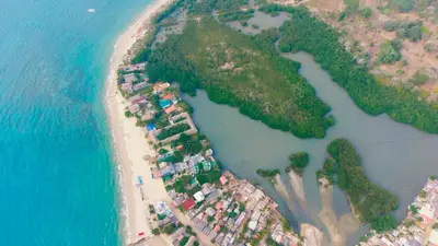 an aerial view of a beach and the ocean at Quatro palos in Rincón