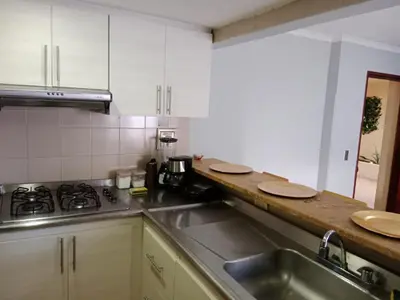 a kitchen with a sink and a counter top at Apartamento mar in Cartagena de Indias