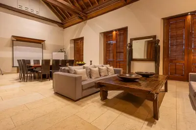 a living room with a couch and a table at Ananda Hotel Boutique in Cartagena de Indias