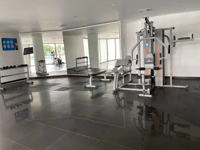 a gym with a treadmill and a bench in a room at Playa -Boquilla -Apto en Condominio in Cartagena de Indias