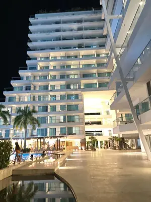 a large building with a pool in front of it at Playa -Boquilla -Apto en Condominio in Cartagena de Indias