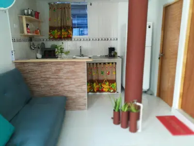 a small kitchen with a sink and a counter at En mi casa cartagena in Cartagena de Indias