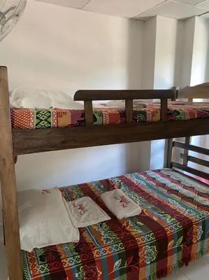 two bunk beds sitting on top of a room at En mi casa cartagena in Cartagena de Indias