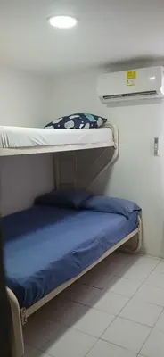 a room with two bunk beds in a room at Casa La Fe in Cartagena de Indias