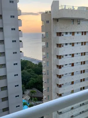 a view of the ocean from the balcony of a building at Edificio kuali apto 1704 in Santa Marta