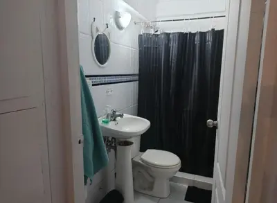 a bathroom with a sink and a toilet and a shower at @casa__grace in Cartagena de Indias
