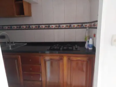 a kitchen with a sink and a counter top at TITTO'S APARTMENT in Cartagena de Indias
